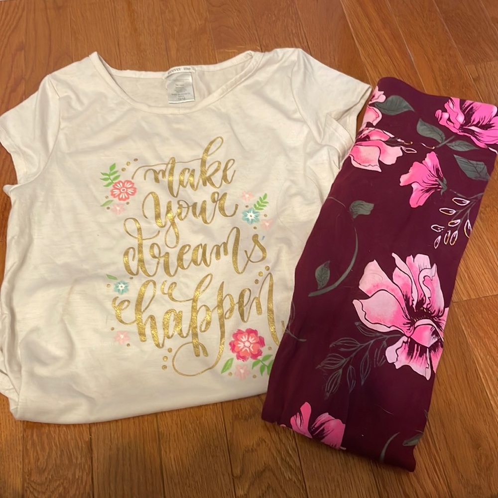 Flower pants and shirt pants are maroon shirt is white